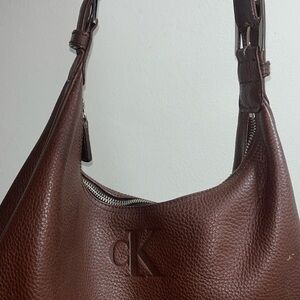 Calvin Klein, very comfortable to carry, could literally hold anything.